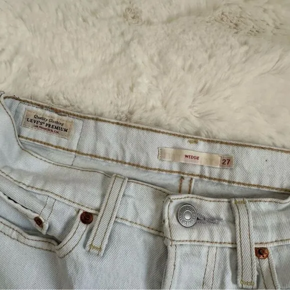 Levi’s light wash 27 wedgie pale blue/white ish jeans from Urban Outfitters